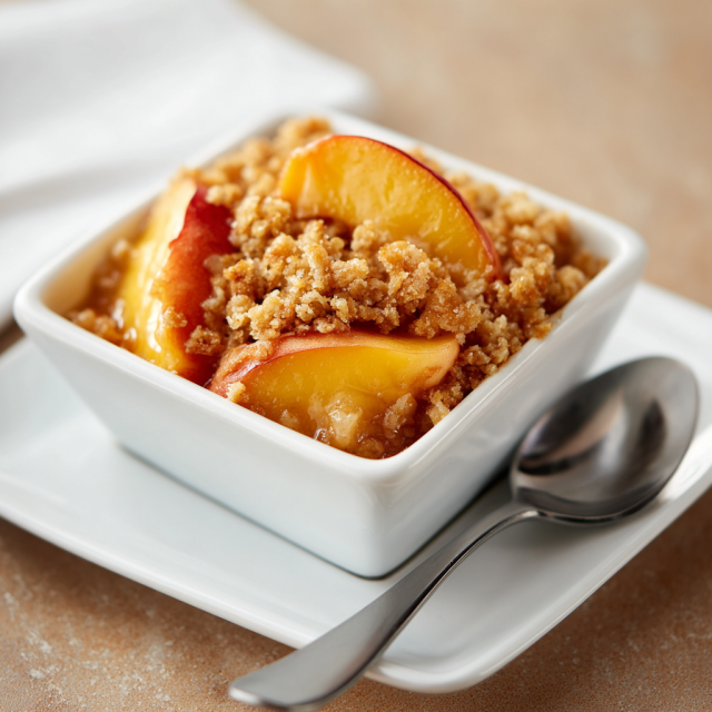 Peach crisp cake mix dessert with golden topping